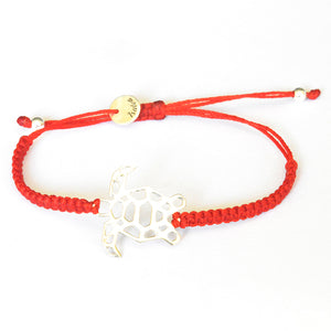 Pulsera de macramé con dije de tortuga